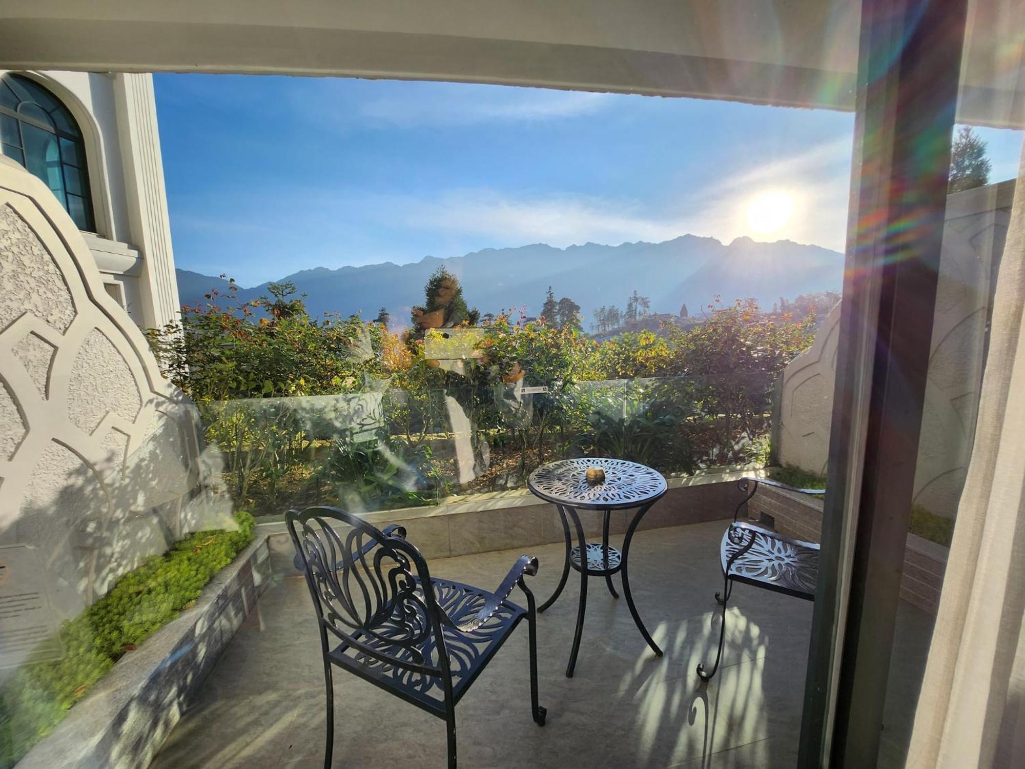 Silk Path Grand Sapa Resort & Spa Exterior photo View from the balcony of a suite at the Hotel del Monte
